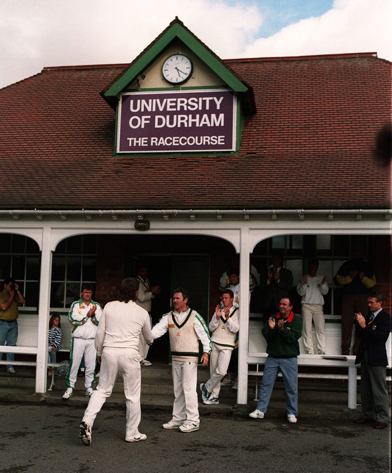 Ian Botham shakes hands with Allan Border during his final match, Durham v Australians, Durham University Ground, July 19, 1993