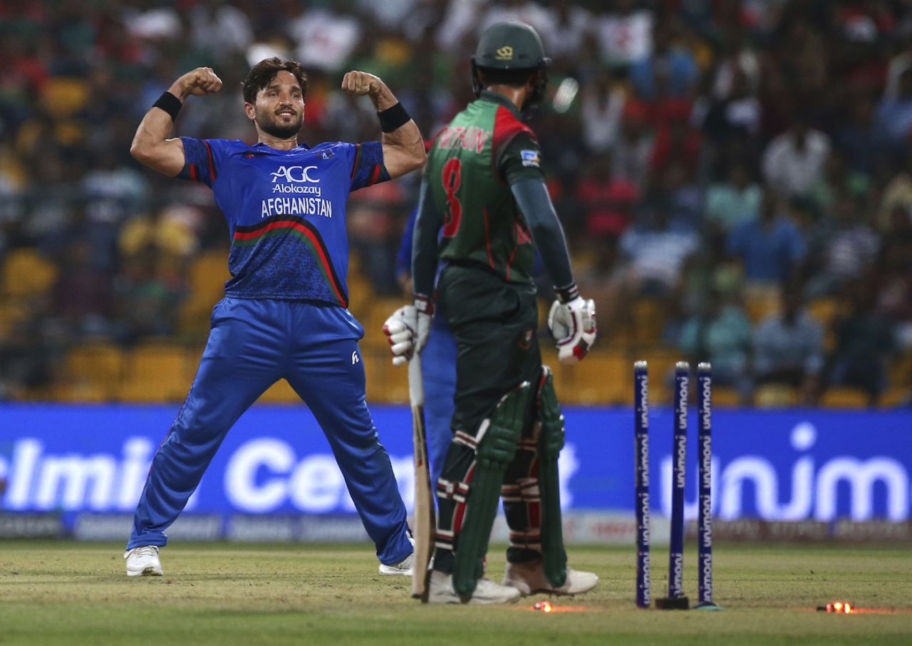 Gulbadin Naib flexes his muscles after snaring a wicket, Afghanistan v Bangladesh, Group B, Asia Cup 2018, Abu Dhabi, September 20, 2018