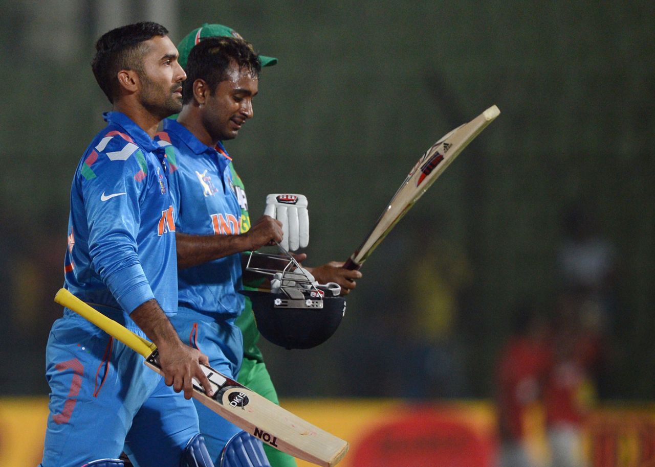 Dinesh Karthik and Ambati Rayudu walk off the field after winning the match, Bangladesh  v India, Asia Cup 2014, Fatullah, February 26, 2014