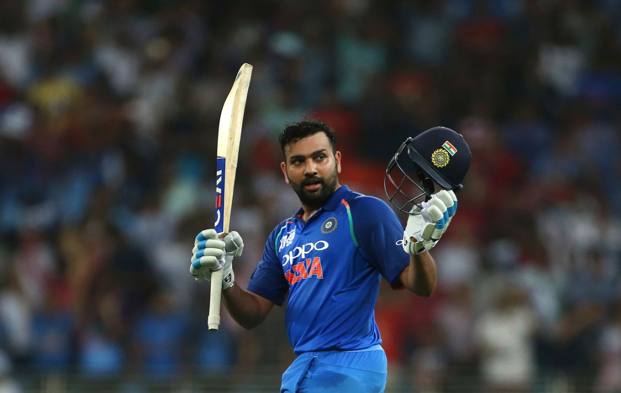 Rohit Sharma raises his bat after getting to his hundred, India v Pakistan, Super Four, Asia Cup 2018, Dubai, September 23, 2018