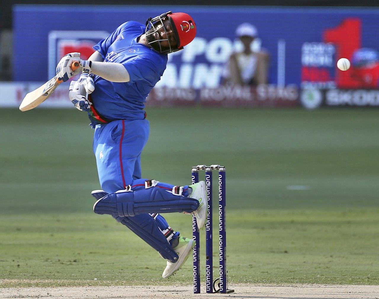 Mohammad Shahzad swerves away from a beamer, Afghanistan v India, Asia Cup 2018, Dubai, September 25, 2018