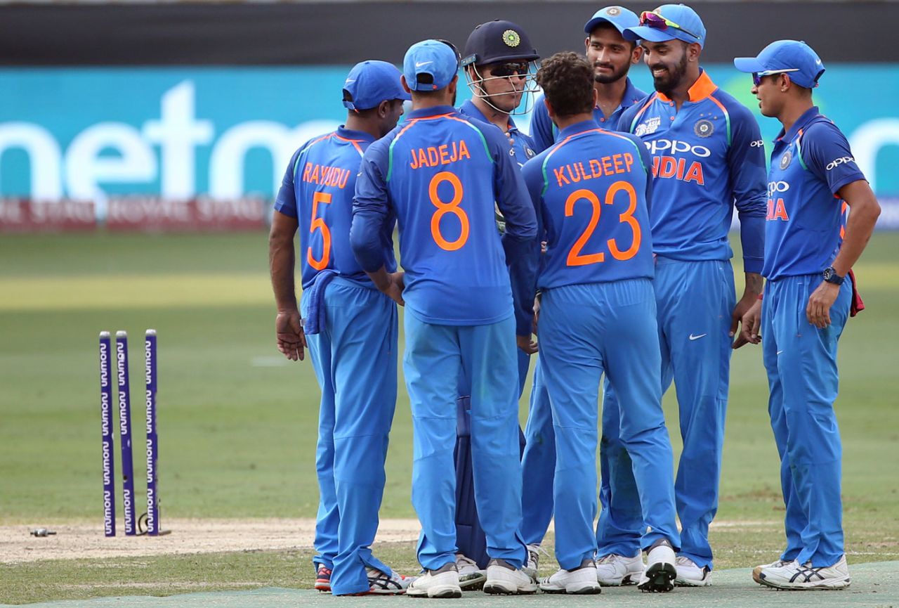 MS Dhoni talks to his team during a wicket celebration, Afghanistan v India, Asia Cup 2018, Dubai, September 25, 2018