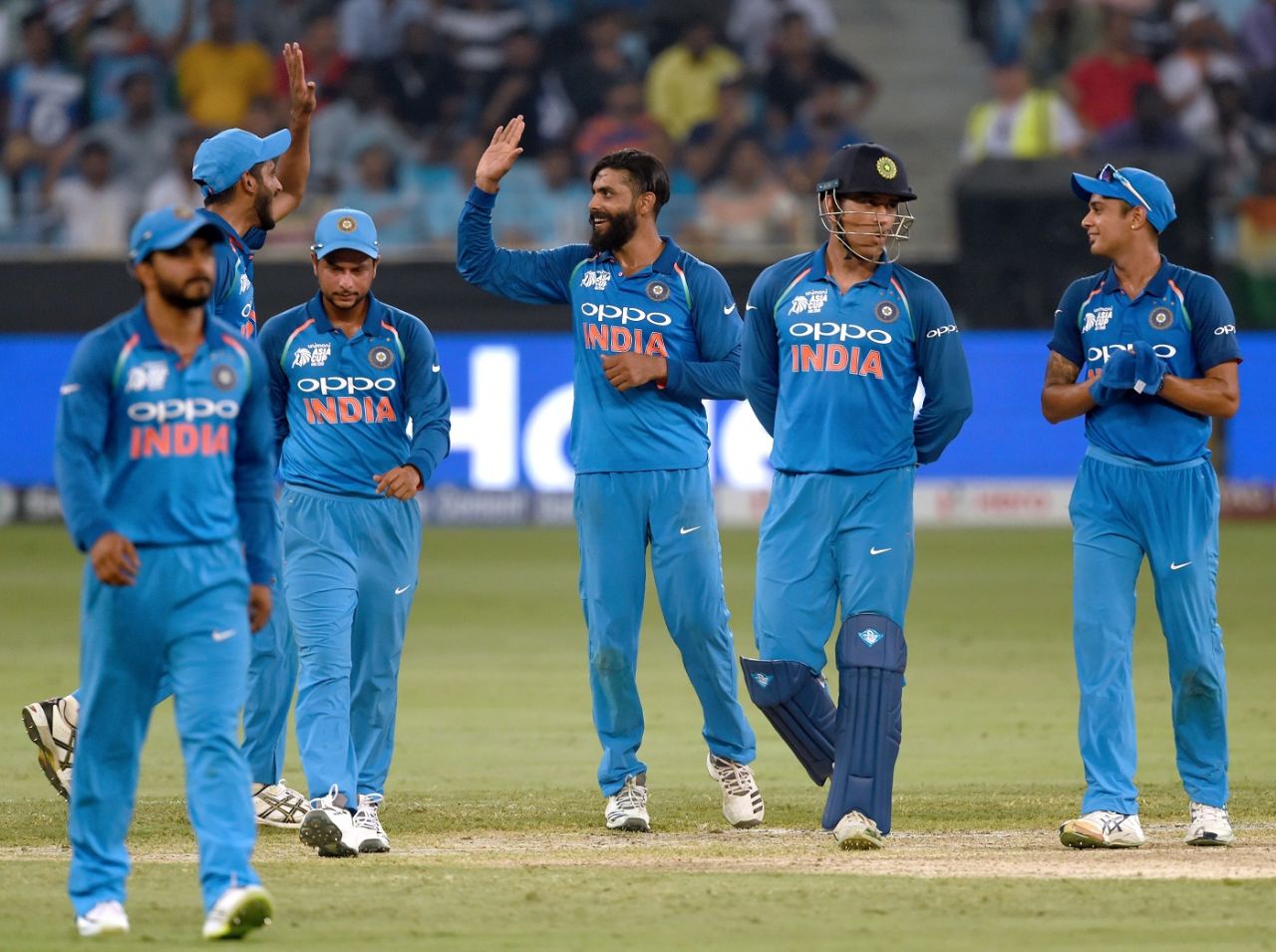 Ravindra Jadeja celebrates a wicket with his team-mates, Afghanistan v India, Asia Cup 2018, Dubai, September 25, 2018