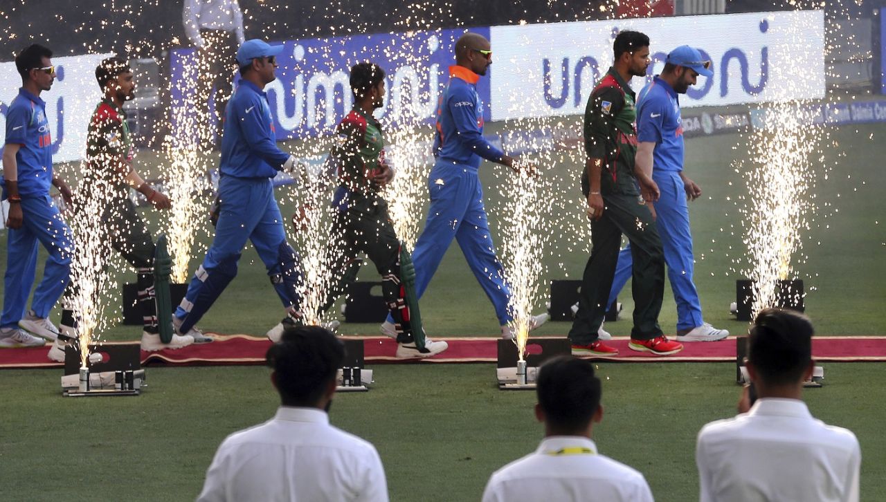 Rohit Sharma and Mashrafe Mortaza lead the teams out, Bangladesh v India, Asia Cup final, Dubai, September 28, 2018