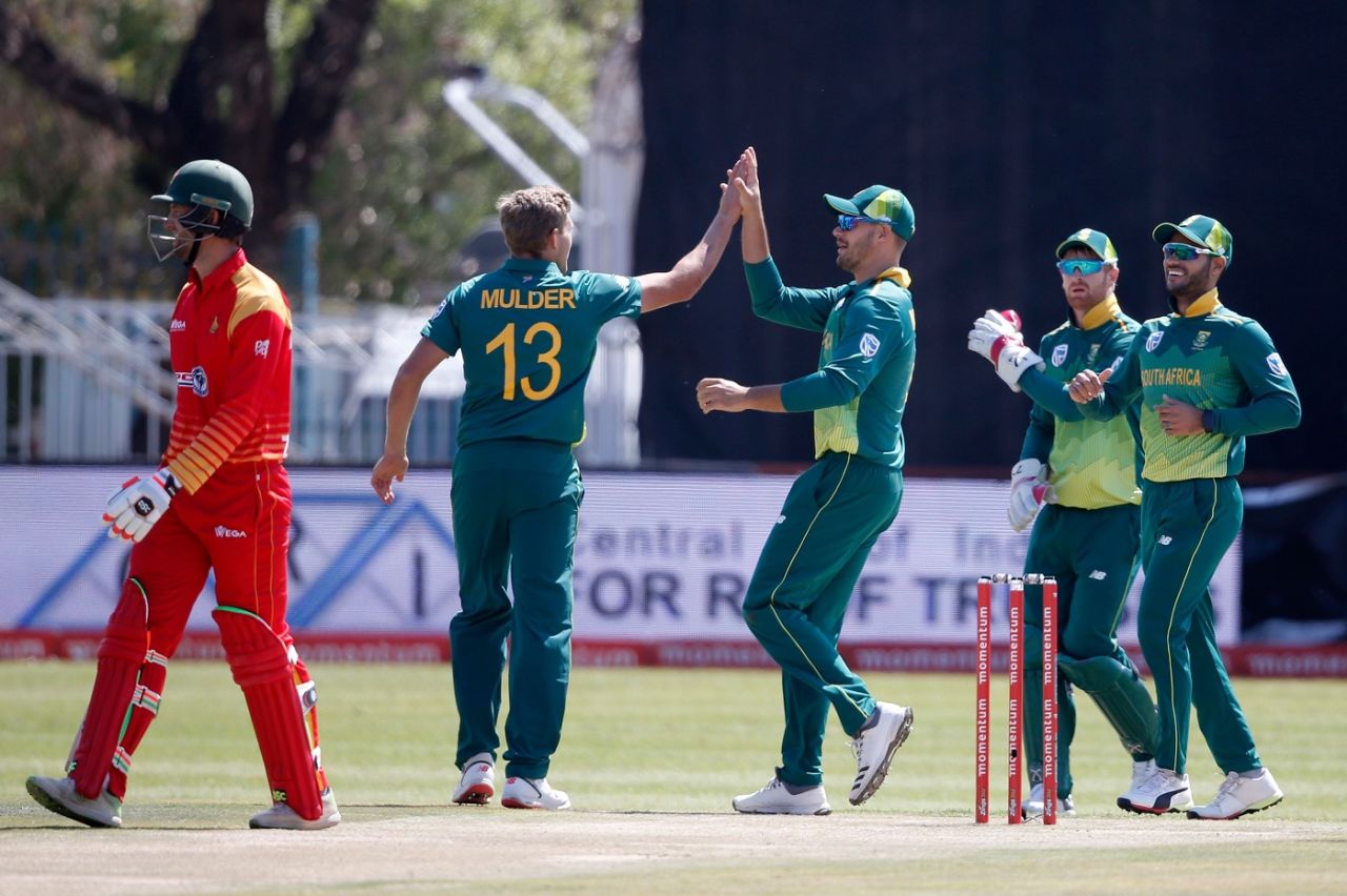 Wiaan Mulder celebrates with his team-mates, South Africa v Zimbabwe, 1st ODI, Diamond Oval, September 30, 2018
