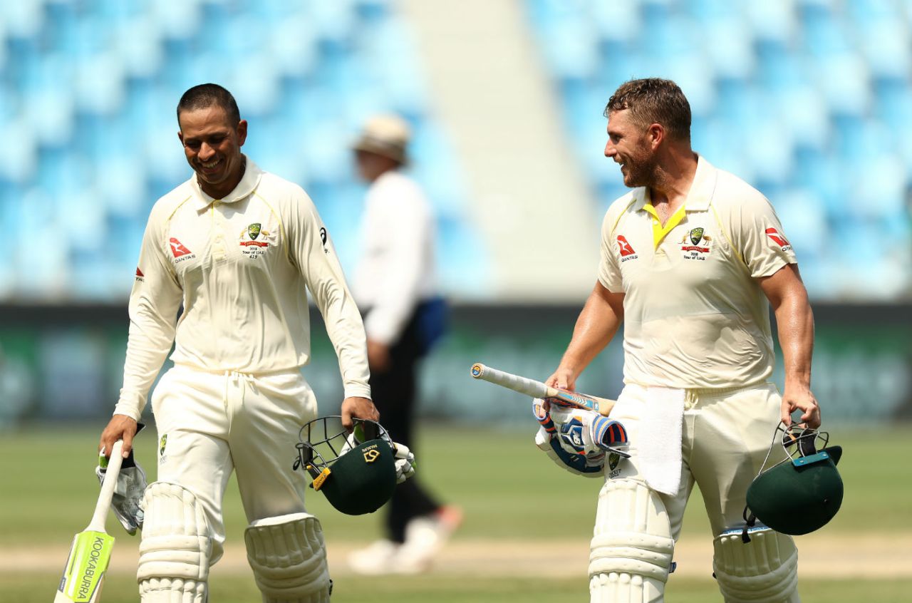 Usman Khawaja and Aaron Finch walk back unscathed at lunch, Pakistan v Australia, 1st Test, Dubai, 3rd day, October 9, 2018