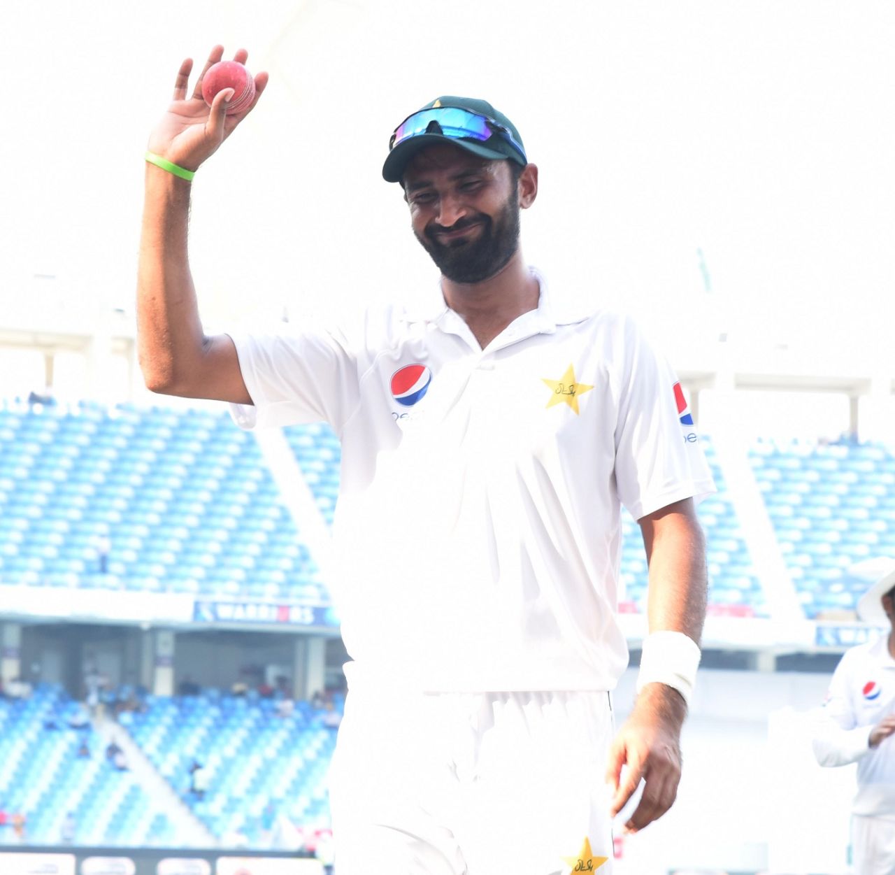 Bilal Asif raises the ball after taking a six-for on debut, Pakistan v Australia, 1st Test, Dubai, 3rd day, October 9, 2018