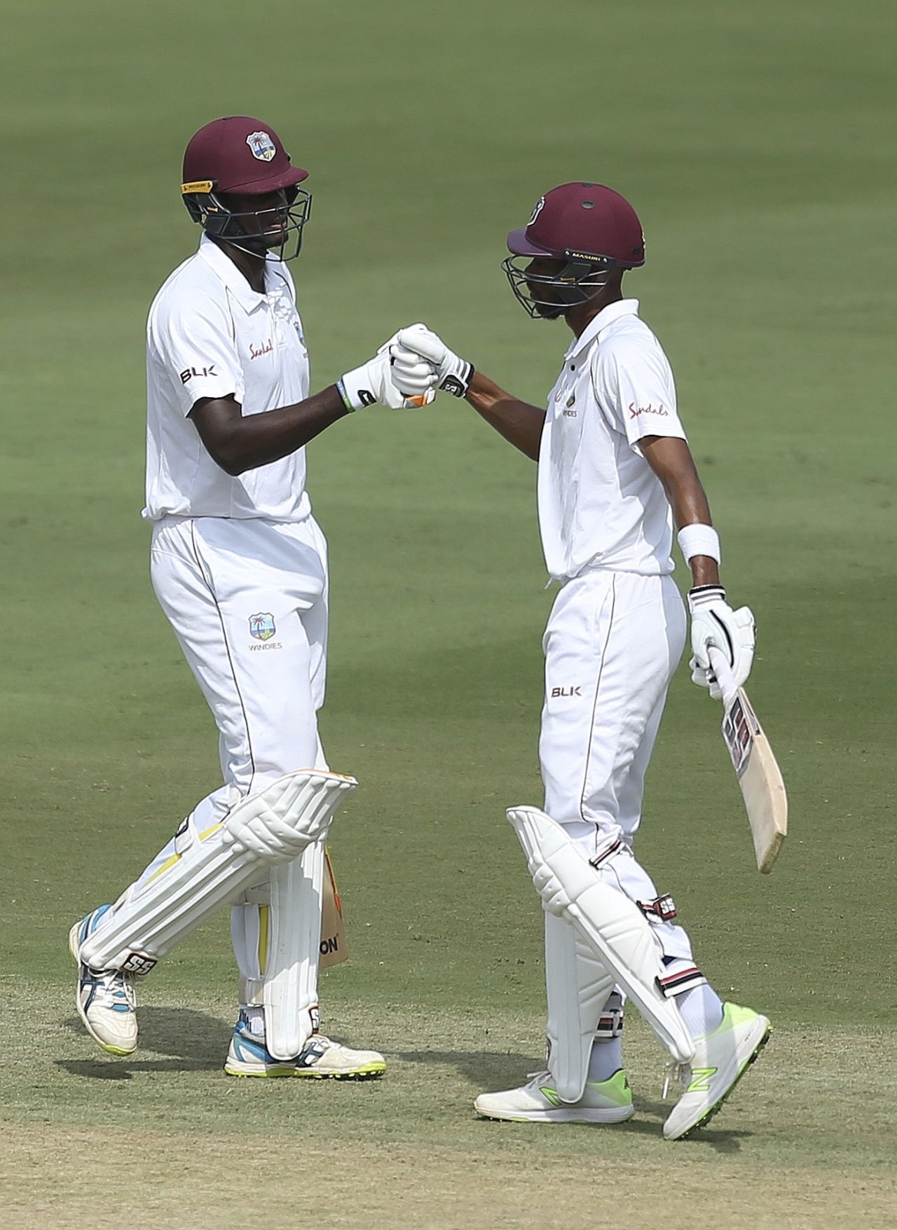 Jason Holder and Roston Chase punch gloves, India v West Indies, 2nd Test, Hyderabad, 1st day, October 12, 2018