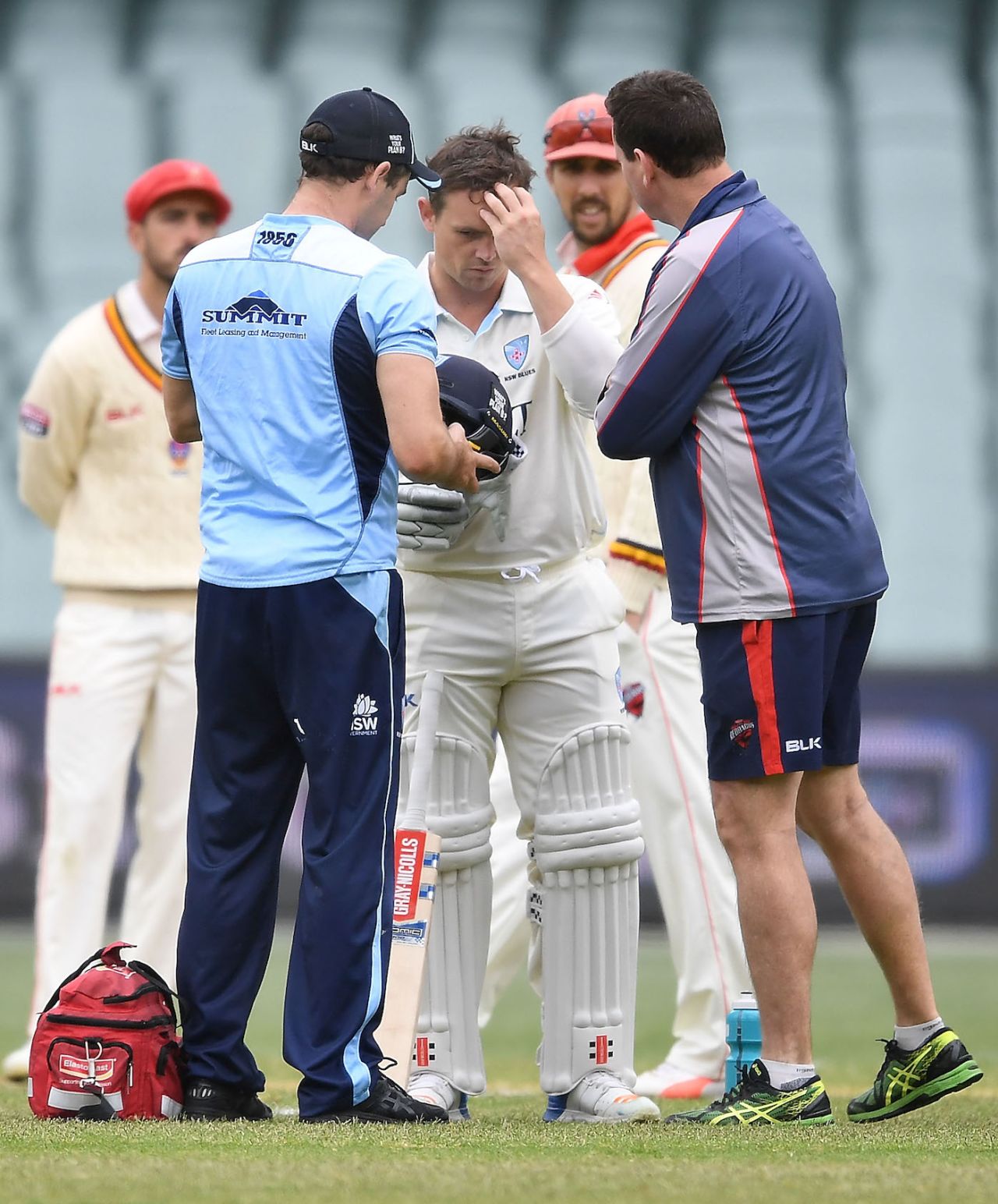 Steve O'Keefe gets checked after being struck on the helmet, South Australia v New South Wales, Sheffield Shield 2018-19, Adelaide, 2nd day, October 17, 2018