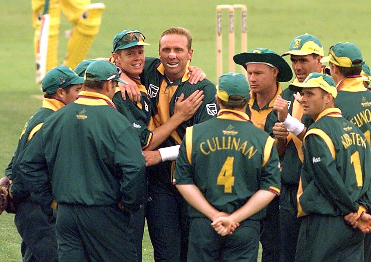 Shaun Pollock and Allan Donald celebrate a wicket with their team-mates, Australia v South Africa, World Cup semi-final, Edgbaston, June 17, 1999.