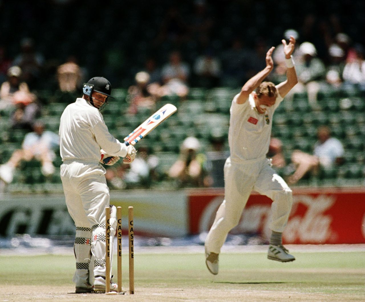 Mike Atherton looks back at his stumps after being bowled by Allan Donald, South Africa v England, 2nd Test, Johannesburg, 2nd day, December 1, 1995