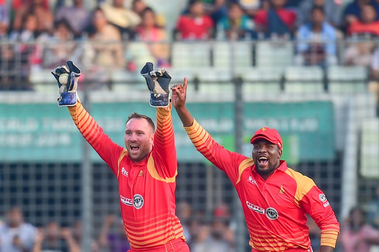 Brendan Taylor and Hamilton Masakadza celebrate a wicket, Bangladesh v Zimbabwe, 1st ODI, Mirpur, October 21, 2018