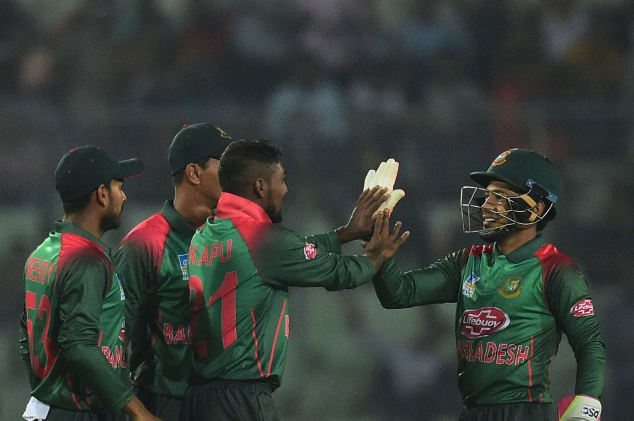 Nazmul Islam and Mushfiqur Rahim high-five each other, Bangladesh v Zimbabwe, 1st ODI, Mirpur, October 21, 2018
