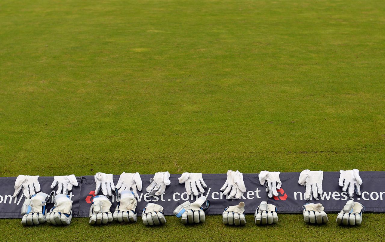 Gloves and inners dry on the boundary rope, Old Trafford, September 8, 2013