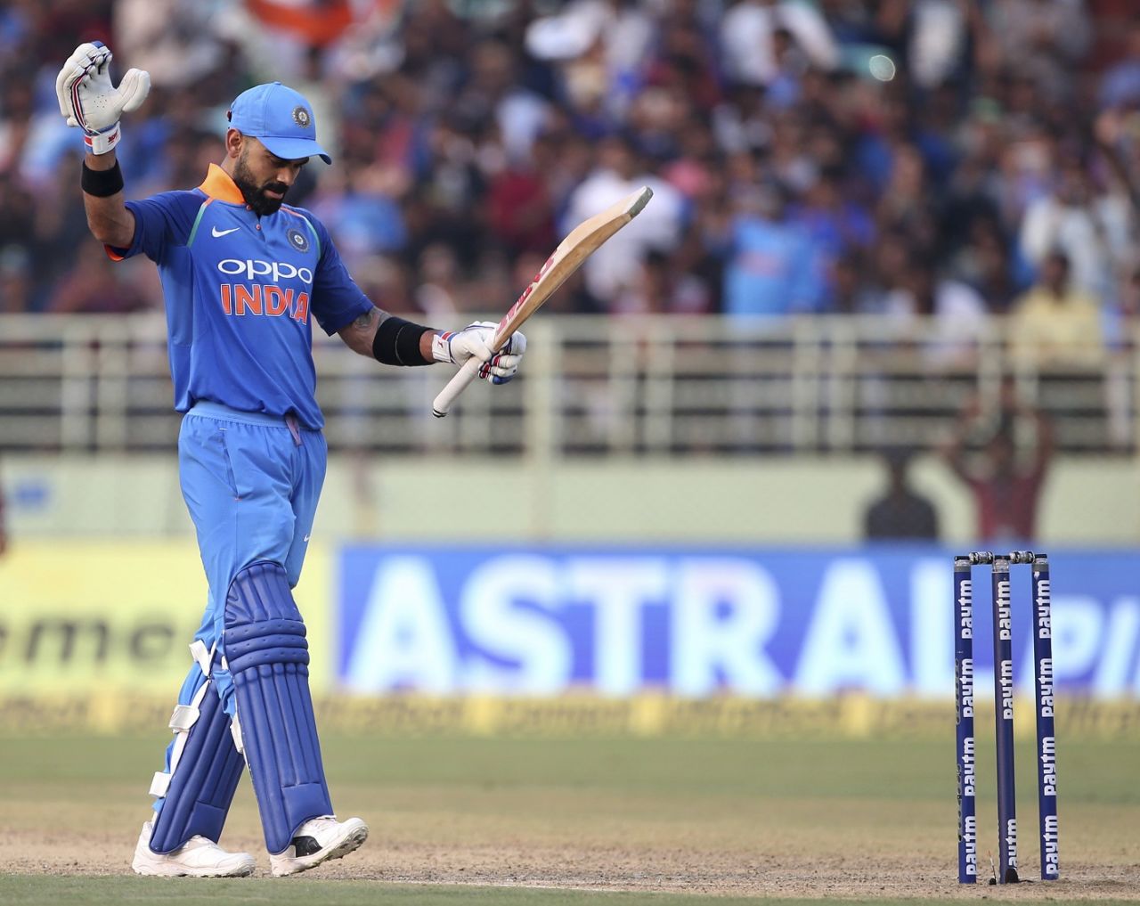 Virat Kohli acknowledges the cheers after becoming the quickest to 10,000 ODI runs, India v West Indies, 2nd ODI, Visakhapatnam, October 24, 2018