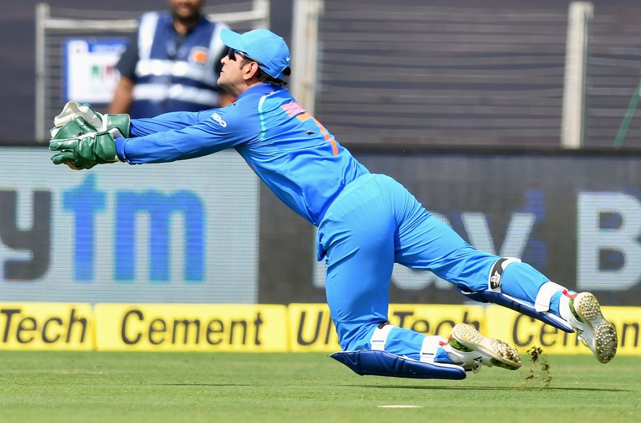MS Dhoni times his dive to perfection and completes a difficult catch, India v West Indies, 3rd ODI, Pune, October 27, 2018