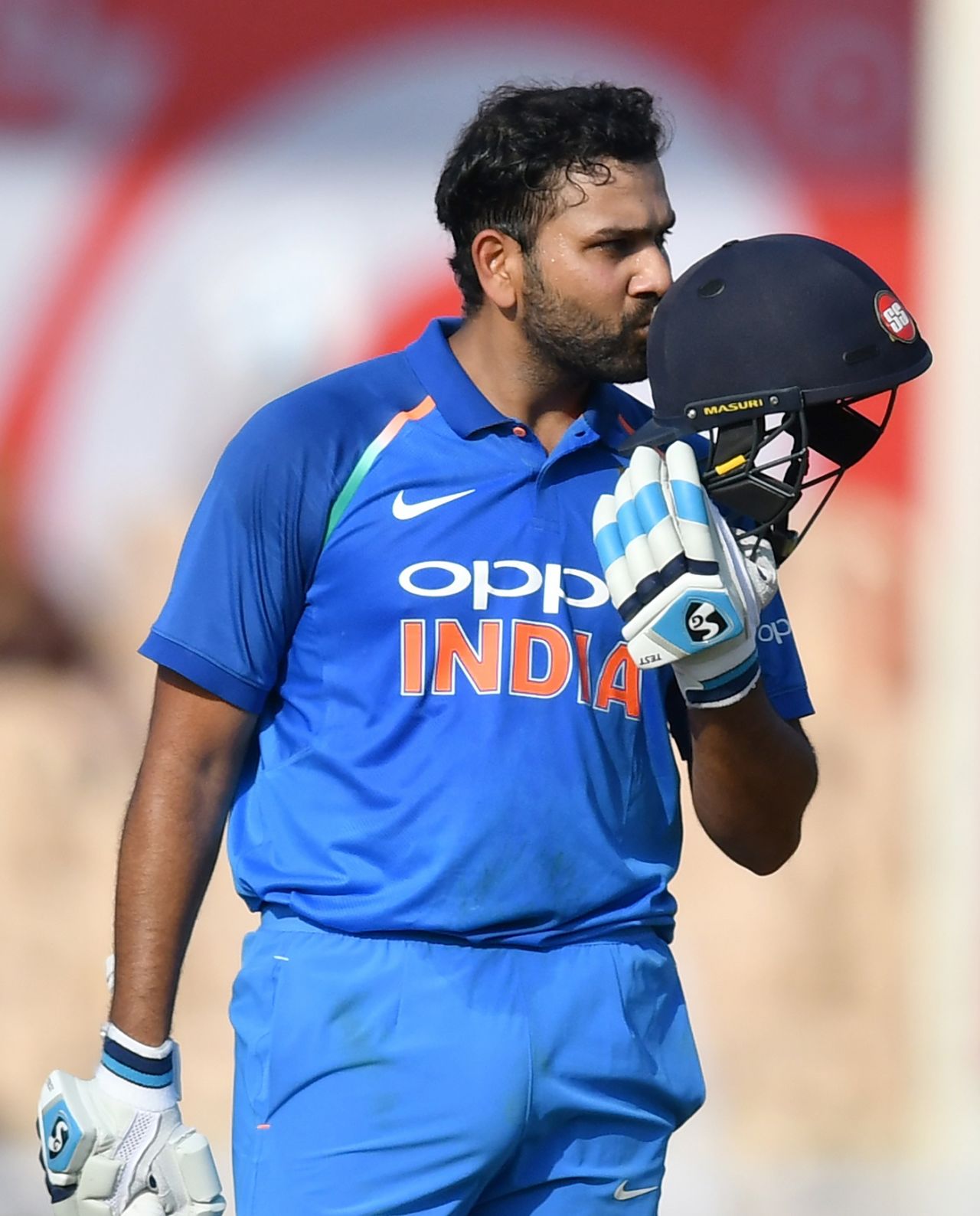 Rohit Sharma kisses his helmet, India v West Indies, 4th ODI, Mumbai, October 29, 2018