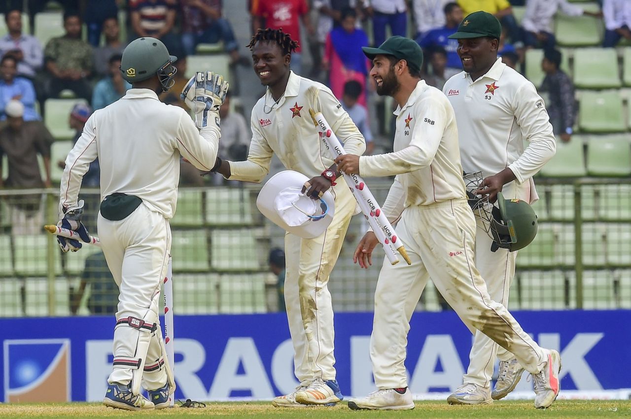 Brandon Mavuta, Sikandar Raza and Hamilton Masakadza are all smiles following Zimbabwe's first overseas Test win in 17 years, Bangladesh v Zimbabwe, 1st Test, Sylhet, 4th day, November 6, 2018
