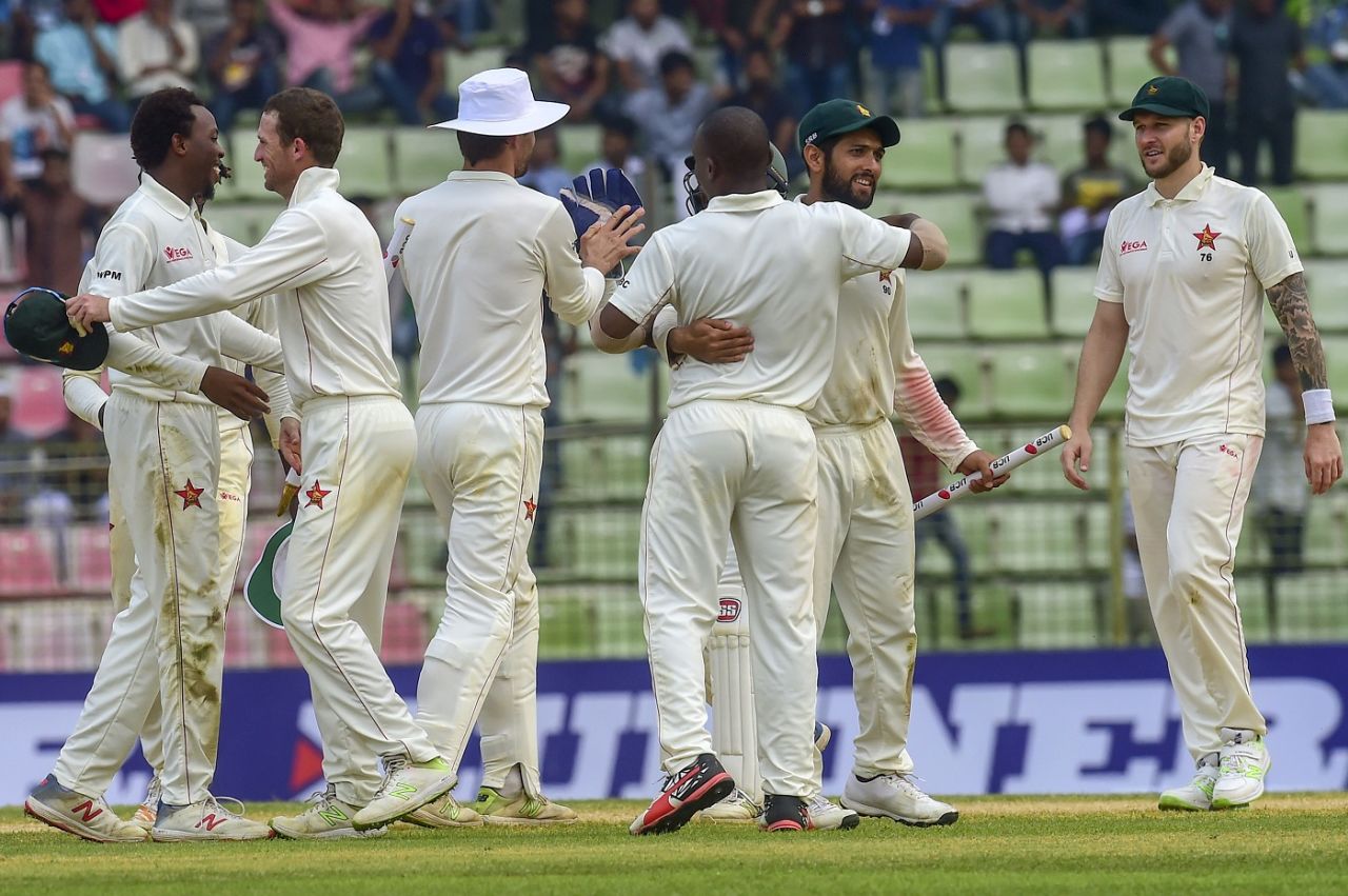 Kyle Jarvis joins his victorious teammates as they celebrate, Bangladesh v Zimbabwe, 1st Test, Sylhet, 4th day, November 6, 2018
