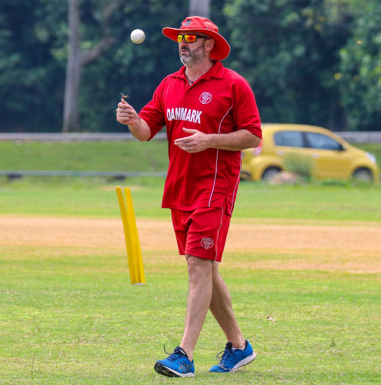 Denmark coach Jeremy Bray flicks a ball in the air as he gets set to begin warmups, Denmark v Malaysia, ICC World Cricket League Division Four, Bangi, May 2, 2018