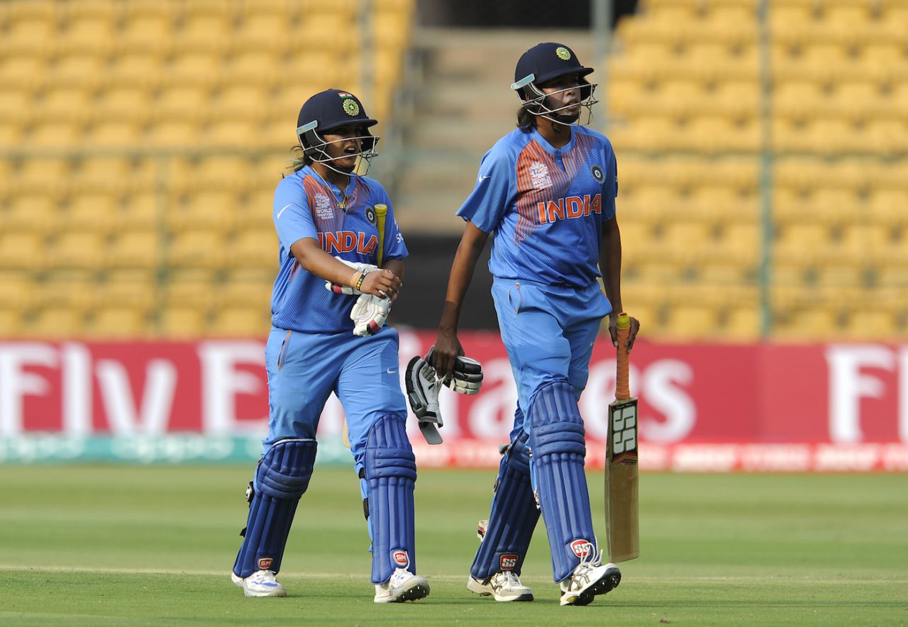 Veda Krishnamurthy and Jhulan Goswami walk back, Women's ICC World Twenty20 India 2016, India v Bangladesh, Chinnaswamy stadium, March 15, 2016 in Bangalore.