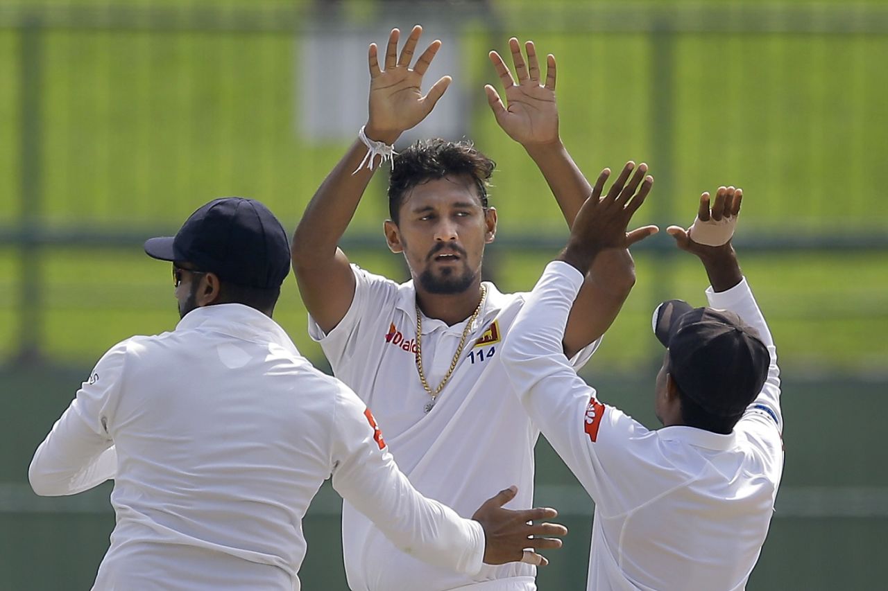 Suranga Lakmal celebrates with his team-mates, Sri Lanka v England, 2nd Test, Pallekele, 1st day, November 14, 2018