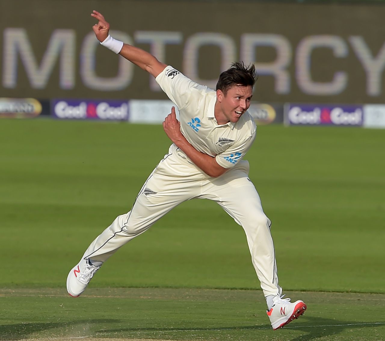 Trent Boult in his follow-through, Pakistan v New Zealand, 1st Test, Abu Dhabi, 1st day
