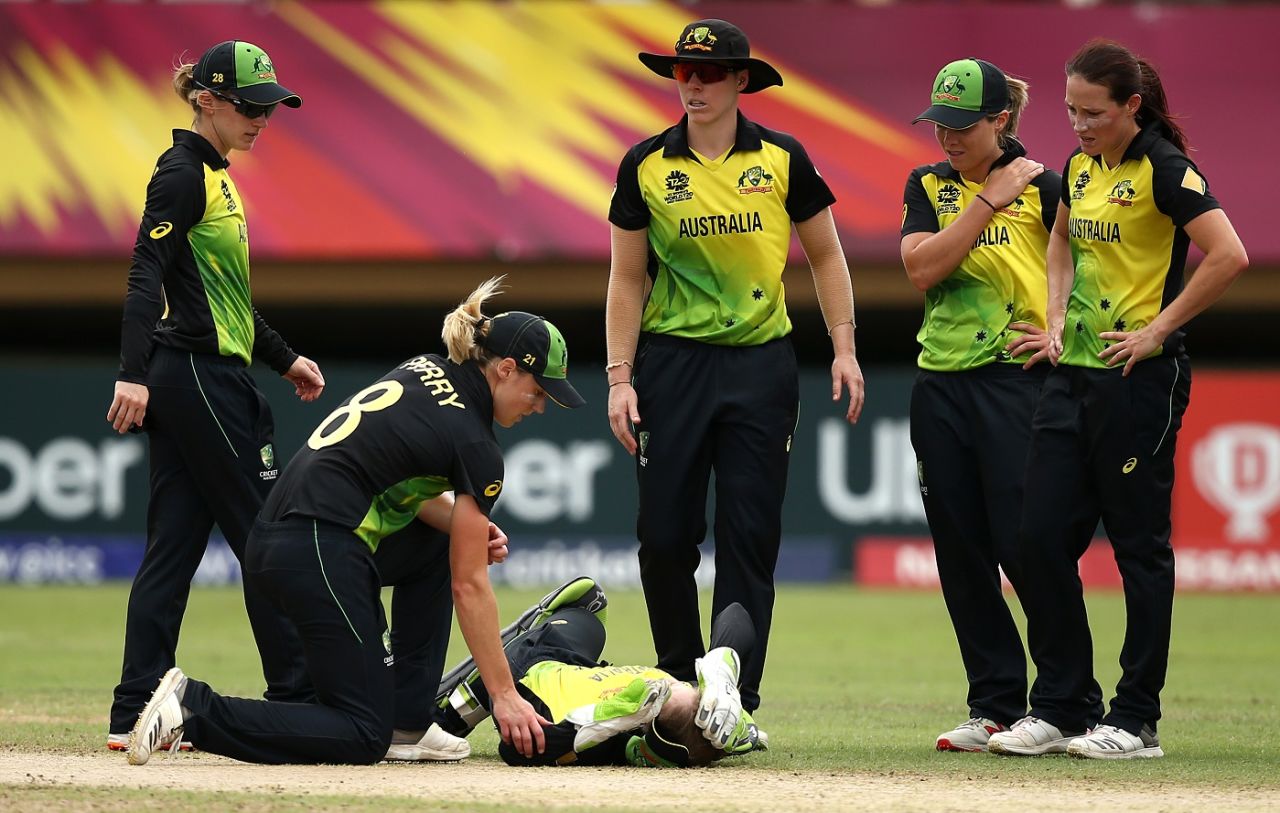 Alyssa Healy lies on the ground injured after crashing into team-mate Megan Schutt, Australia v India, Group B, Women's World T20, Providence, November 18, 2018