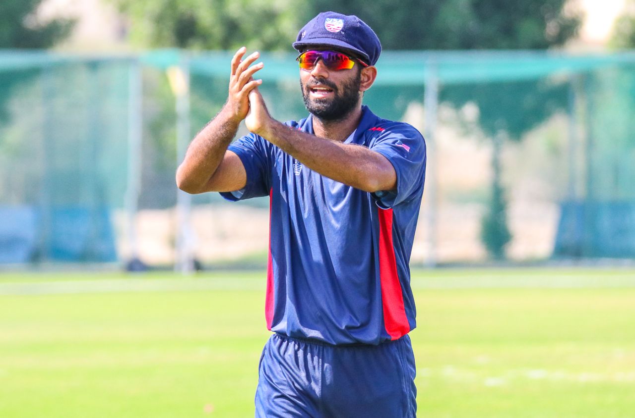 Captain Saurabh Netravalkar reciprocates applause from team-mates after his three-for, Singapore v USA, ICC World Cricket League Division Three, Al Amerat, November 19, 2018