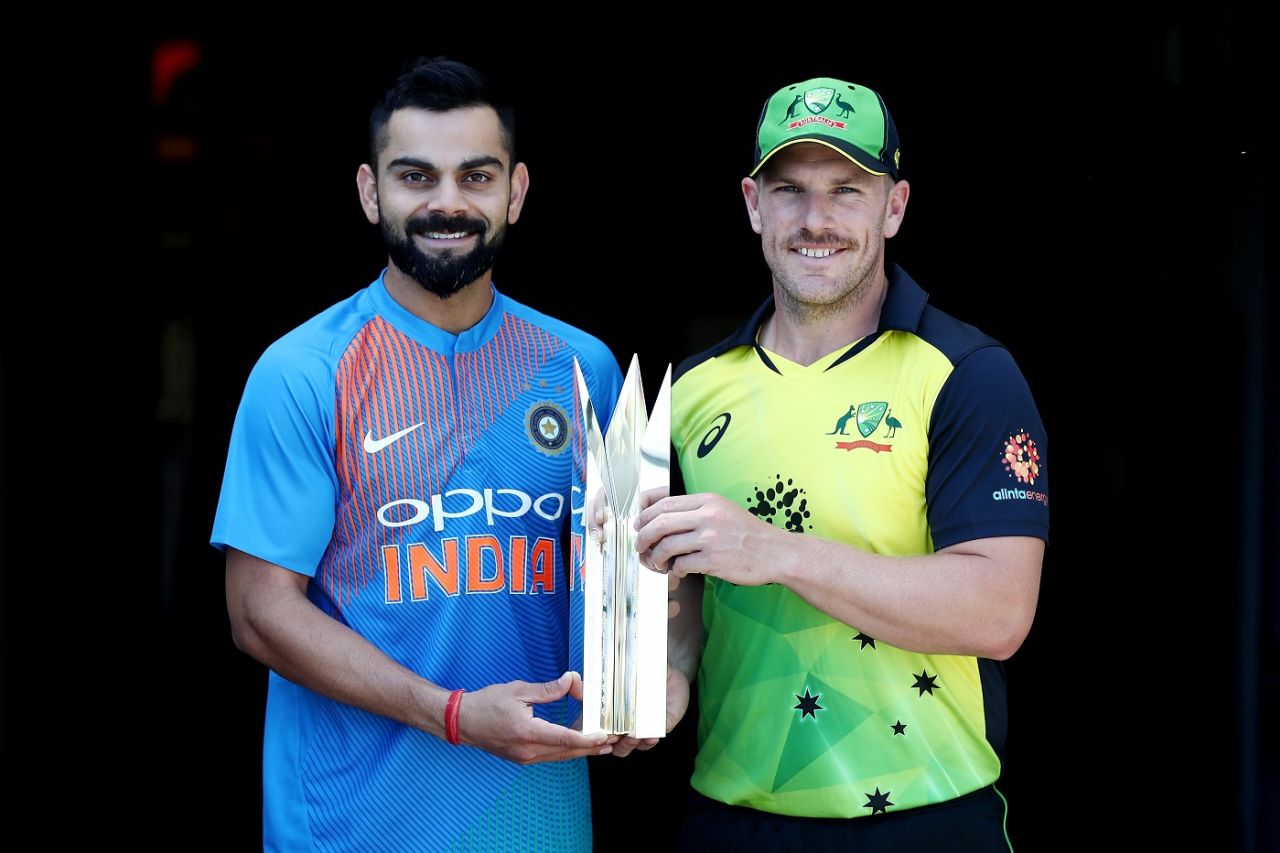 Virat Kohli and Aaron Finch with the T20I series trophy, Brisbane, November 20, 2018