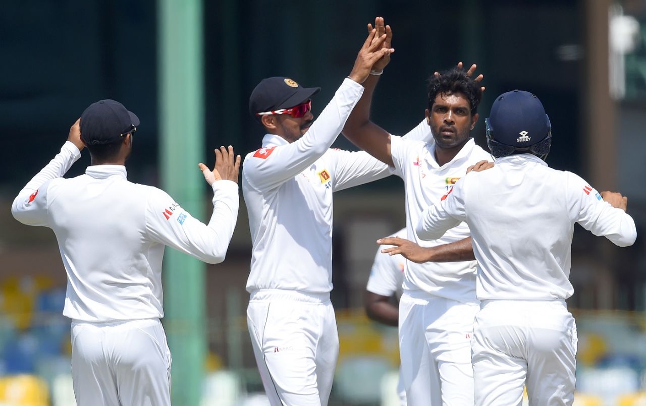 Dilruwan Perera celebrates with his team-mates, Sri Lanka v England, 3rd Test, Colombo, 1st day, November 23, 2018
