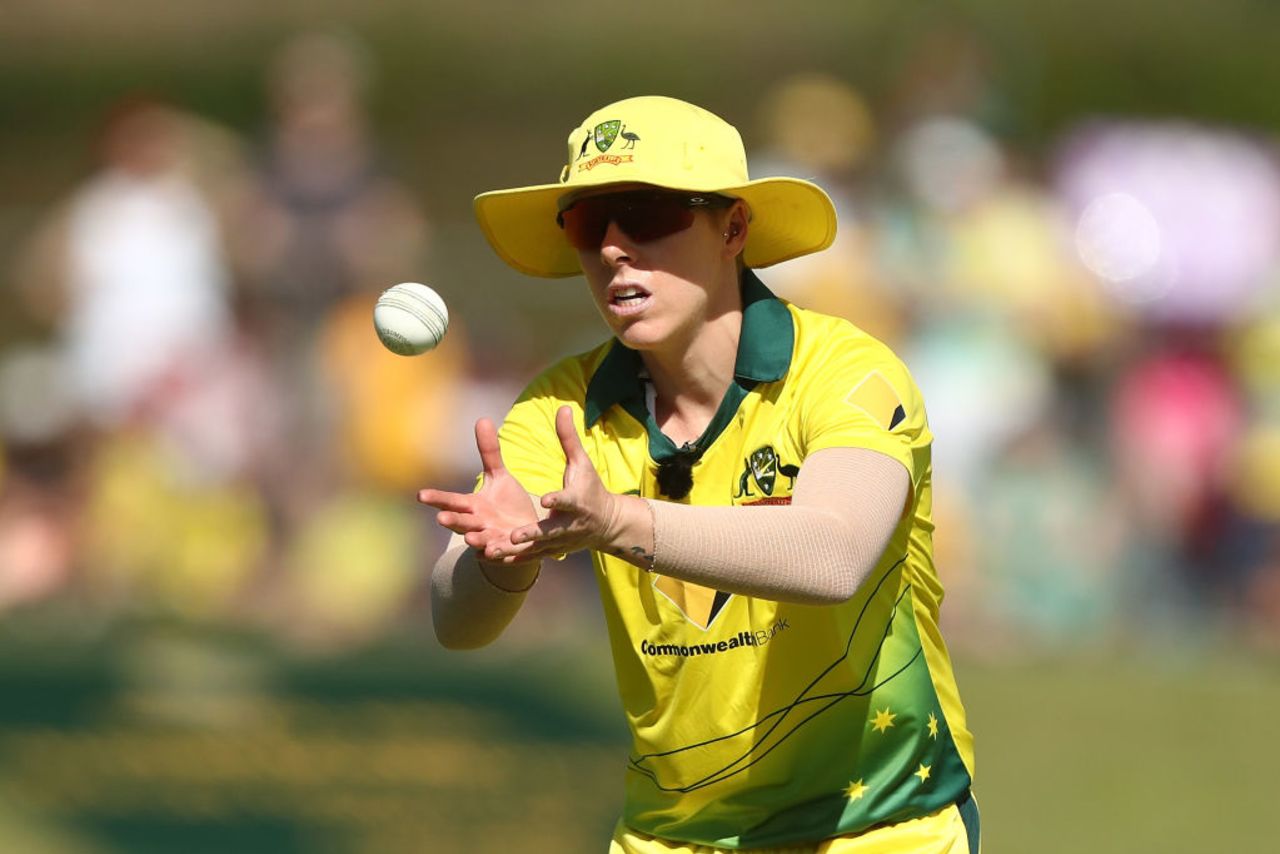 Villani with a floppy hat while fielding in a T20 international against New Zealand 