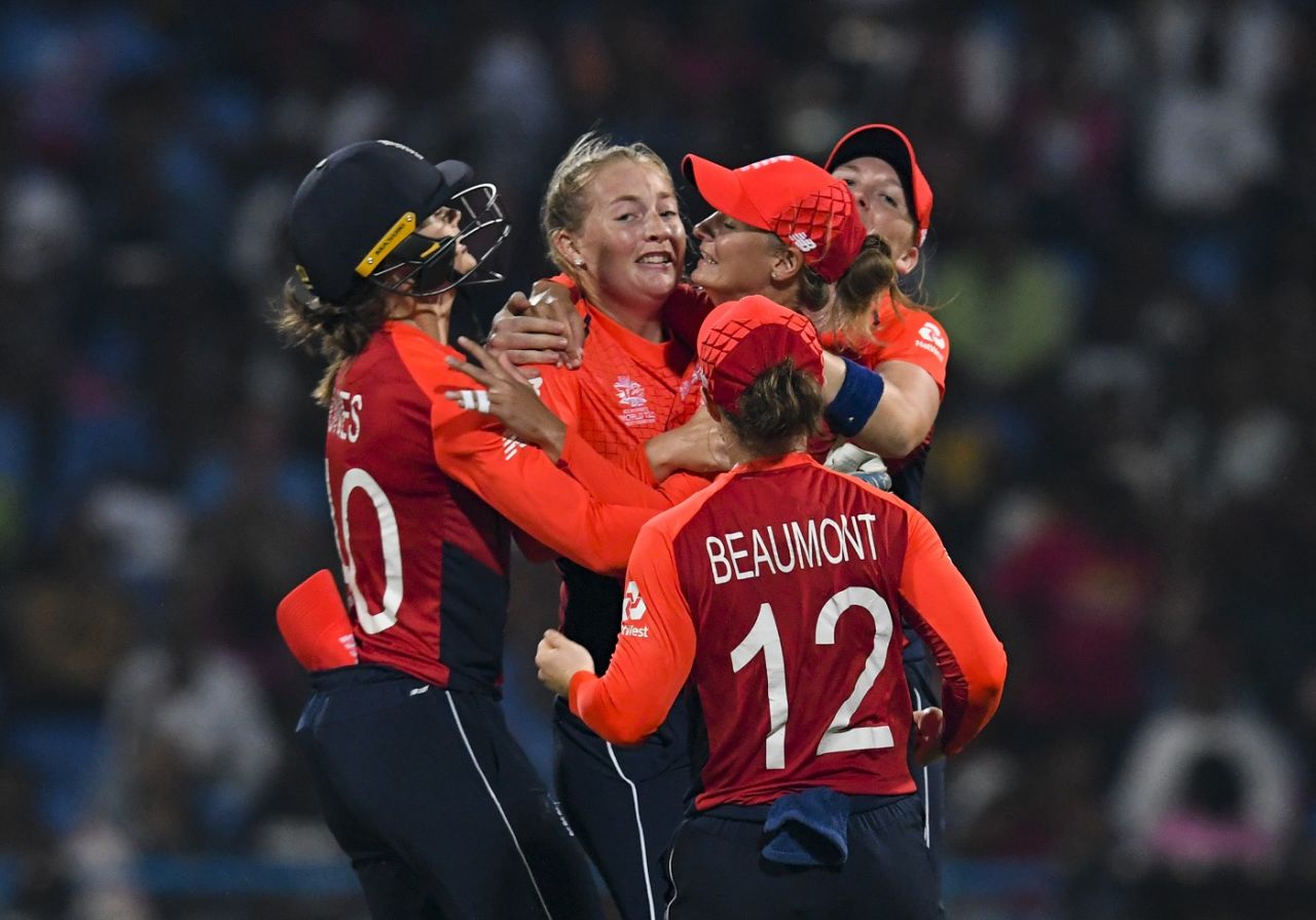 Sophie Ecclestone is mobbed by her team-mates, England v Australia, Women's World T20 final, Antigua, November 24, 2018
