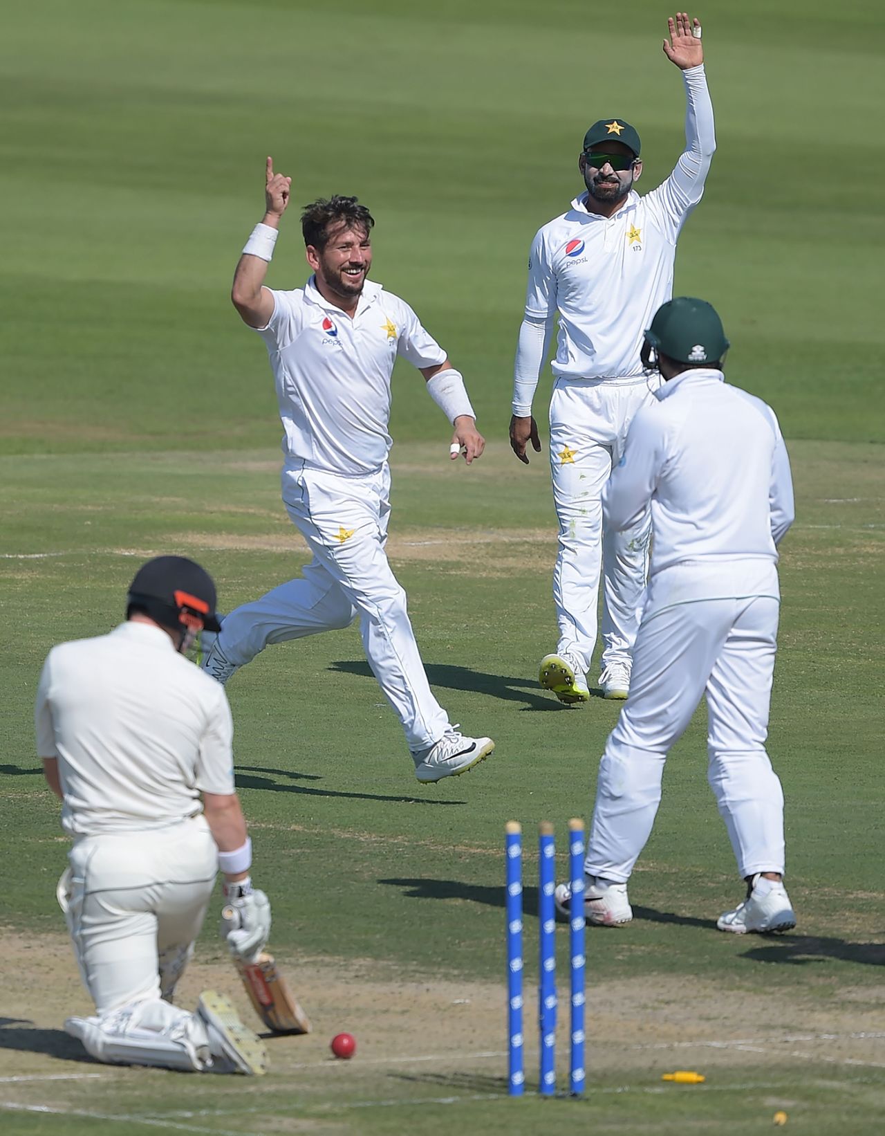 Yasir Shah celebrates after bowling Henry Nicholls round his legs, Pakistan v New Zealand, 3rd Test, Abu Dhabi, 1st day, December 3, 2018