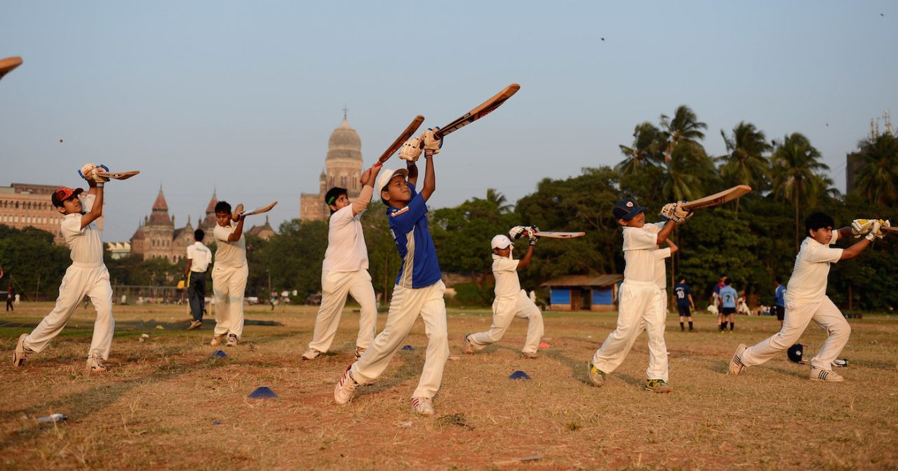Local children take part in cricket practice, Azad Maidan, Mumbai, India November 22, 2012.