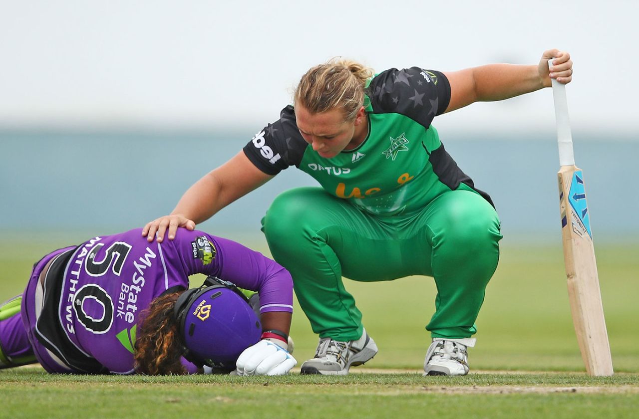 Hayley Matthews is consoled by Nicola Hancock after she suffered an injury, Hobart Hurricanes v Melbourne Stars, WBBL, Launceston, December 9, 2018