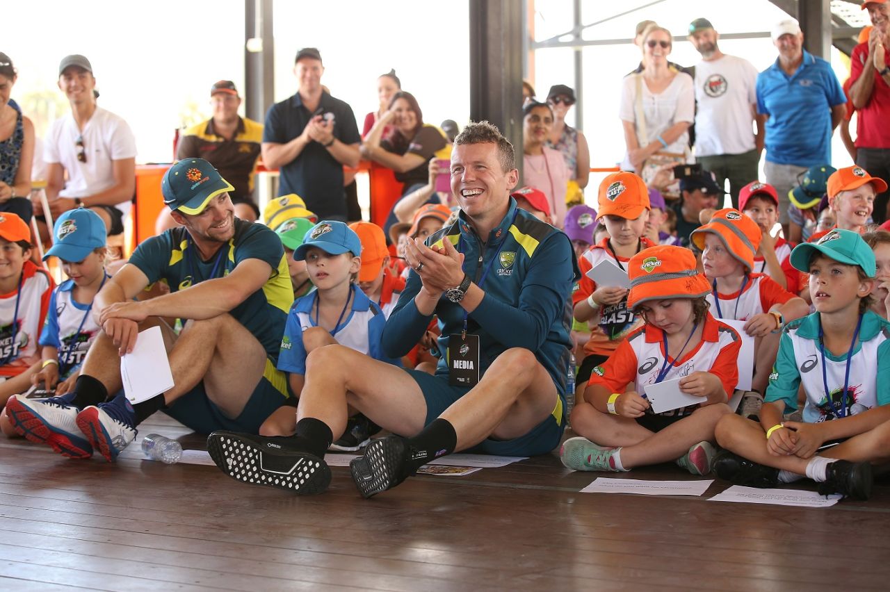 Travis Head and Peter Siddle take part in a mock press conference, Perth, December 12, 2018