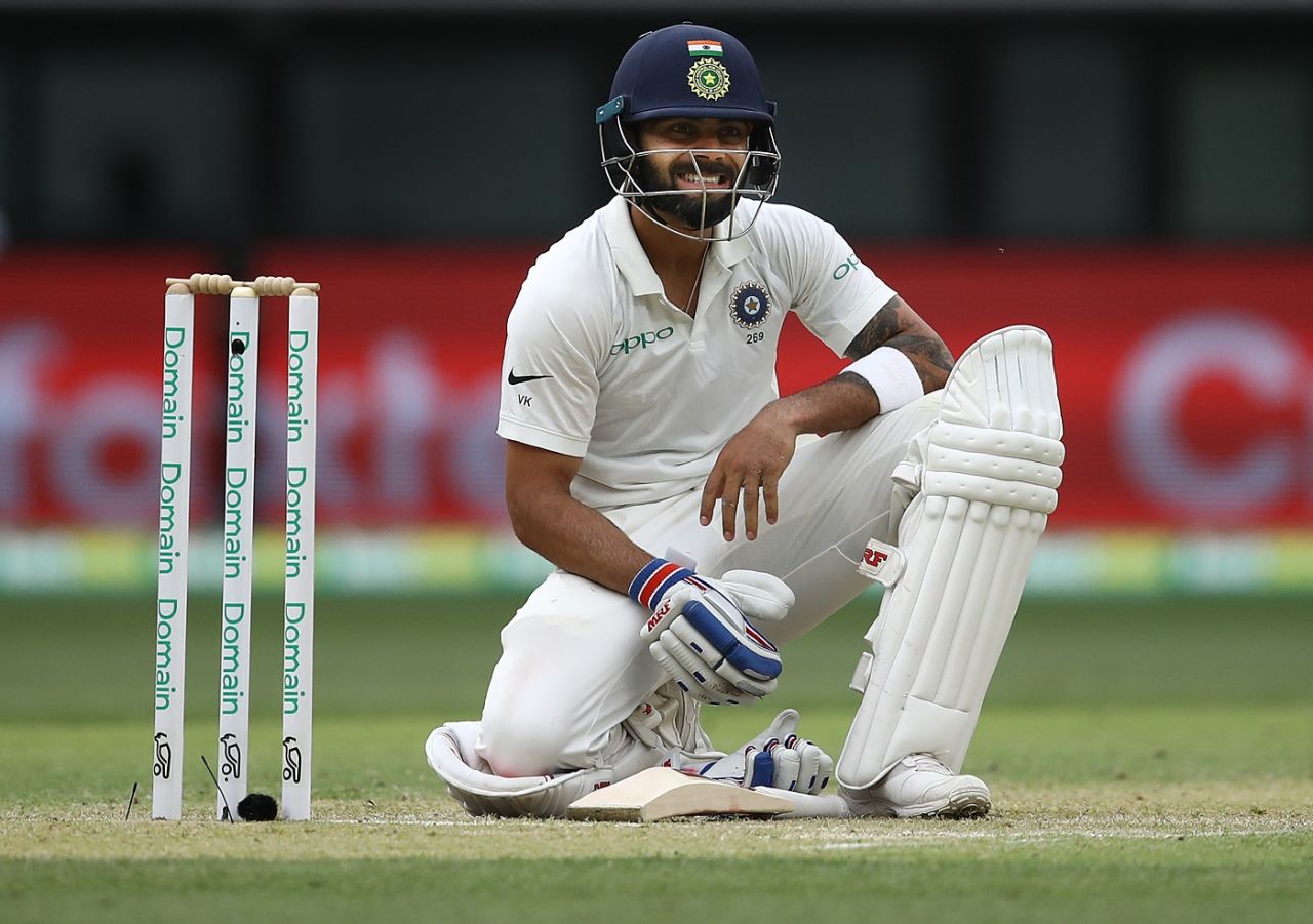 Virat Kohli grimaces after diving and making his ground, Australia v India, 2nd Test, Perth, 2nd day, December 15, 2018