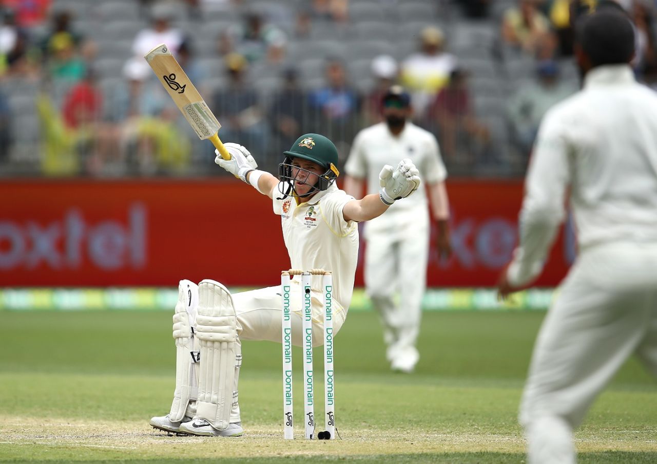 Marcus Harris takes a tumble after being struck on the helmet by Jasprit Bumrah, Australia v India, 2nd Test, Perth, 3rd day, December 16, 2018