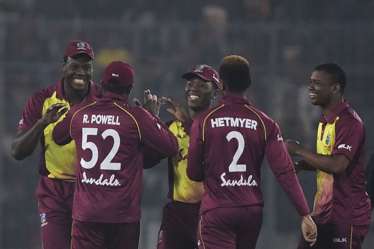 Carlos Brathwaite is all smiles as he celebrates a wicket with his team-mates, Bangladesh v West Indies, 3rd T20I, Mirpur, December 22, 2018