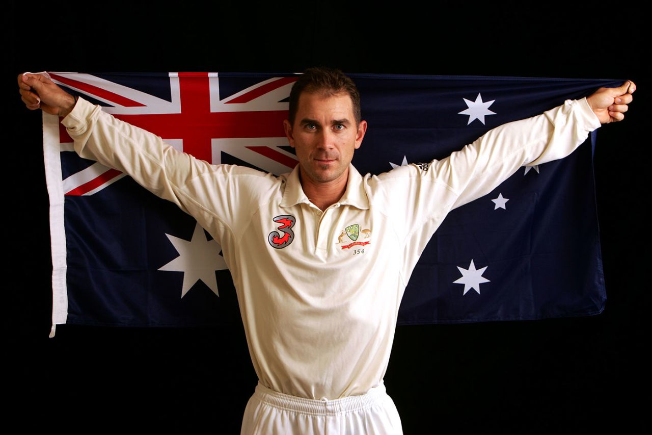 Justin Langer poses with the Australian flag, August 29, 2006