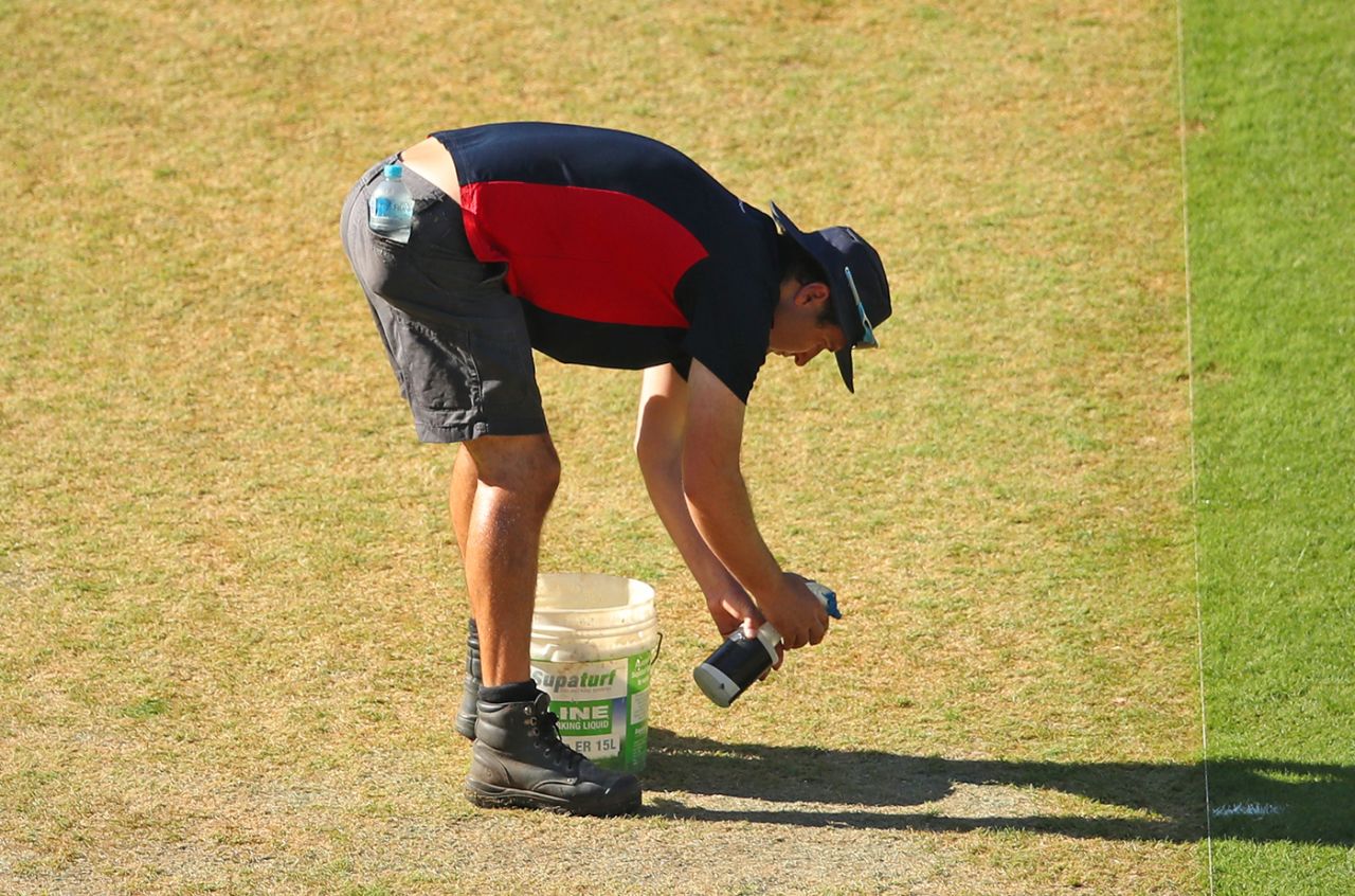 The MCG curator Matt Page works on the pitch during an Australia training session, Melbourne, December 25, 2018