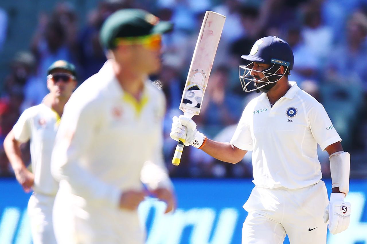 Cheteshwar Pujara raises the bat after getting his fifty, Australia v India, 3rd Test, Melbourne, 1st day, December 26, 2018