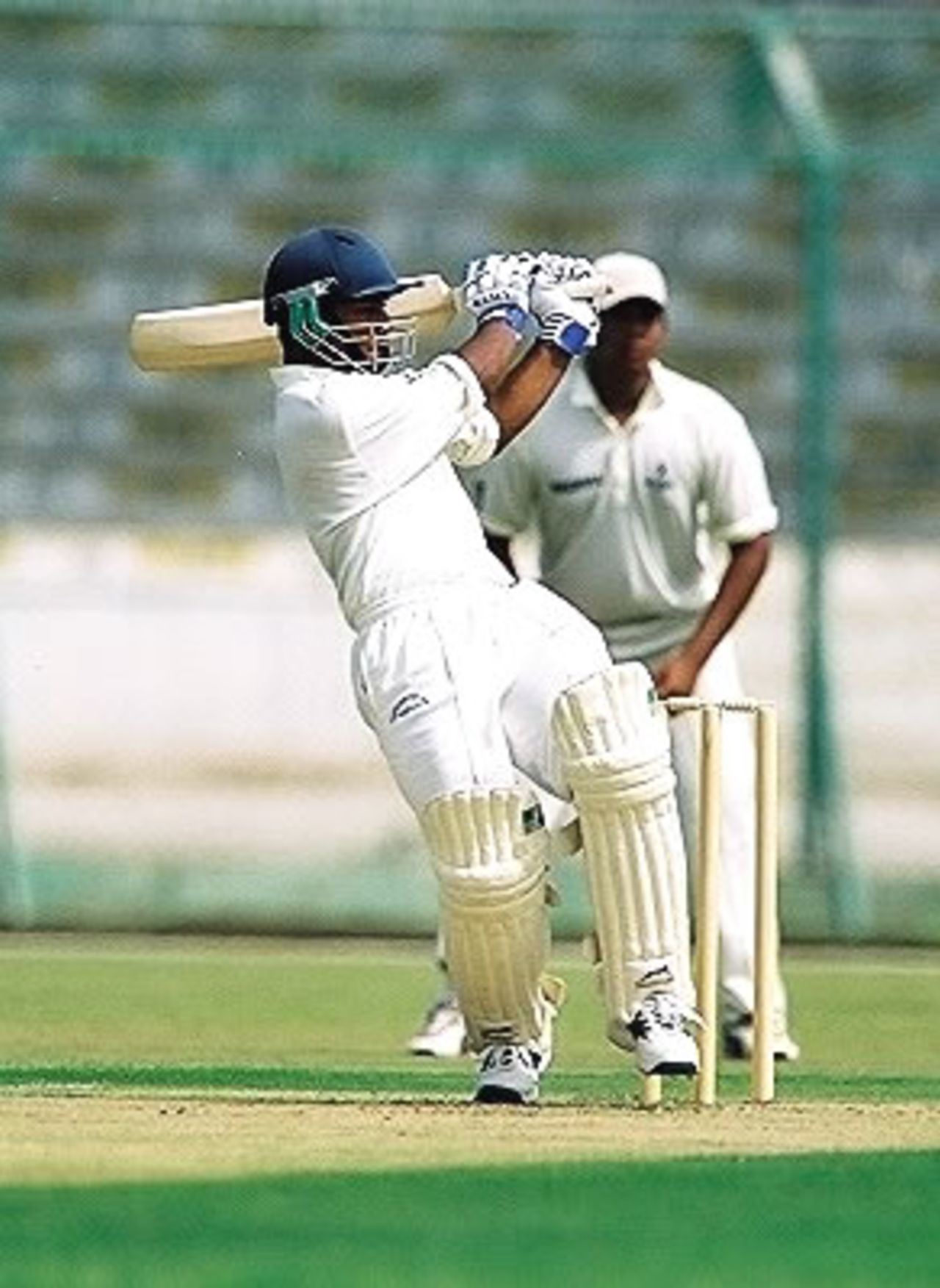 Nepal's centurion and opener Kanishka Chaugai pulls for a boundary during his innings of 125, Nepal Under-19s v Maldives Under-19s at National Stadium Karachi, Youth Asia Cup 2003, 14 July 2003.
