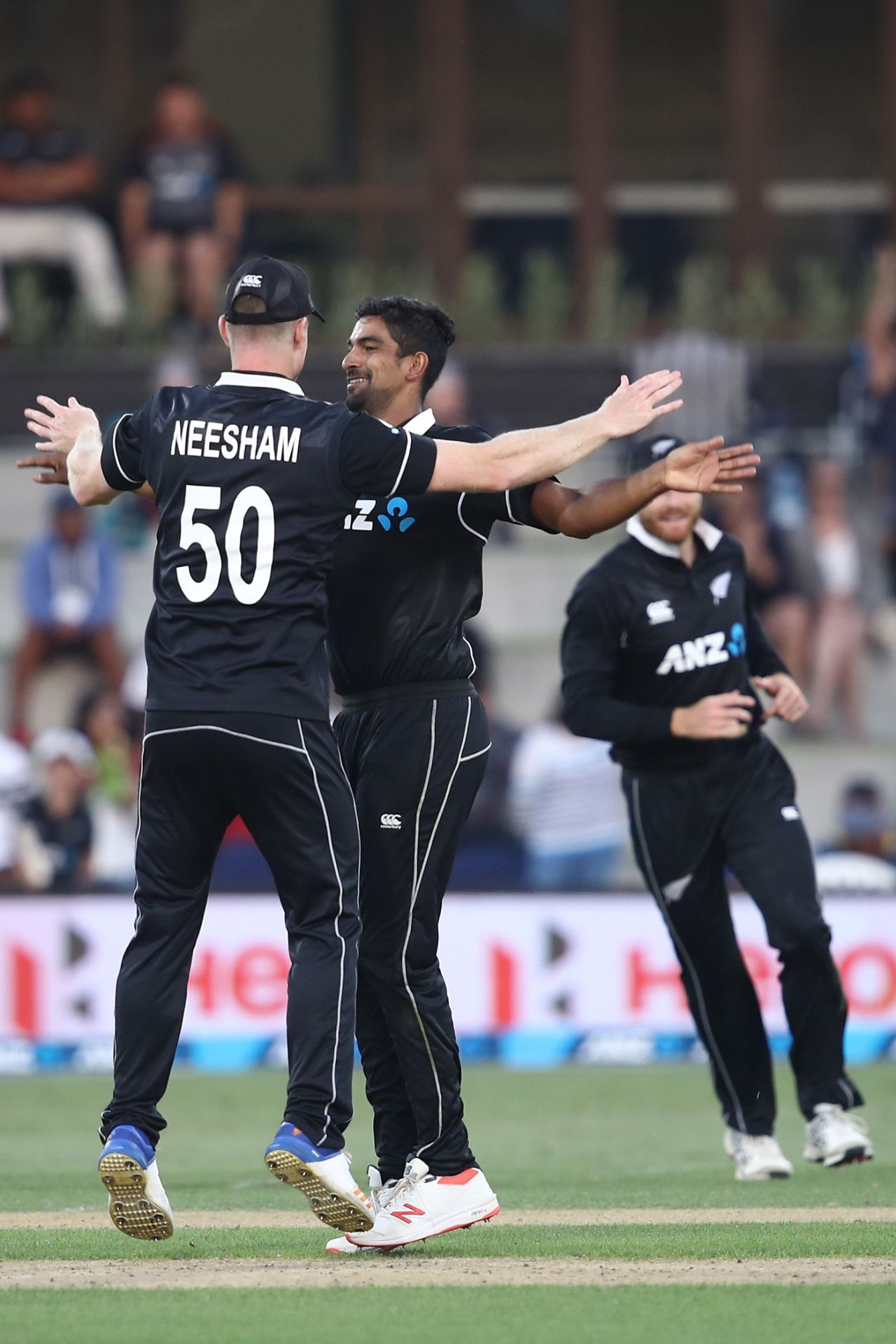 Ish Sodhi celebrates with Jimmy Neesham after a wicket, New Zealand v Sri Lanka, 1st ODI, Mount Maunganui, January 3, 2019