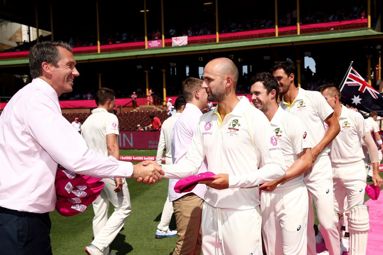 Nathan Lyon and the Australian team present Glenn McGrath with a pink cap, Australia v India, 4th Test, Sydney, 3rd day, January 5, 2019
