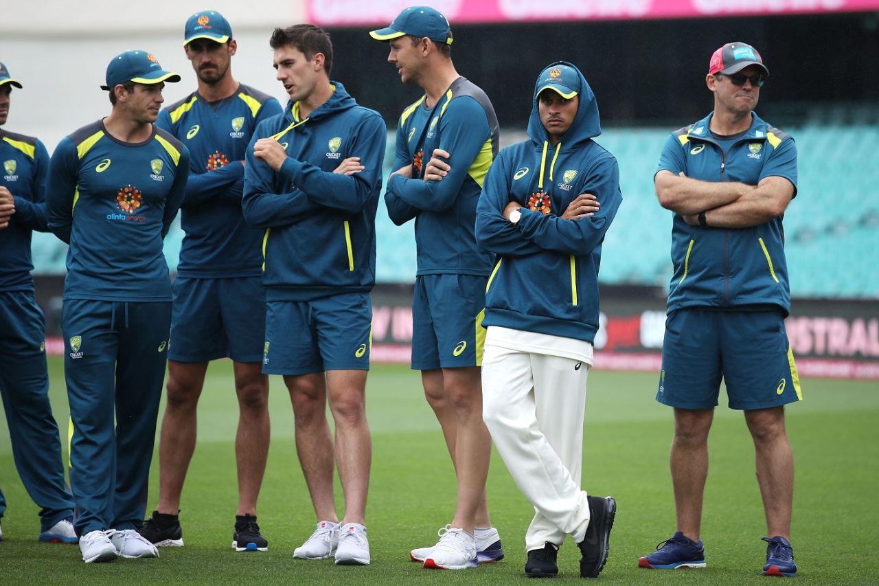Usman Khawaja looks on, with his other team-mates in the background, before the presentation ceremony, Australia v India, 4th Test, Sydney, 5th day, January 7, 2019