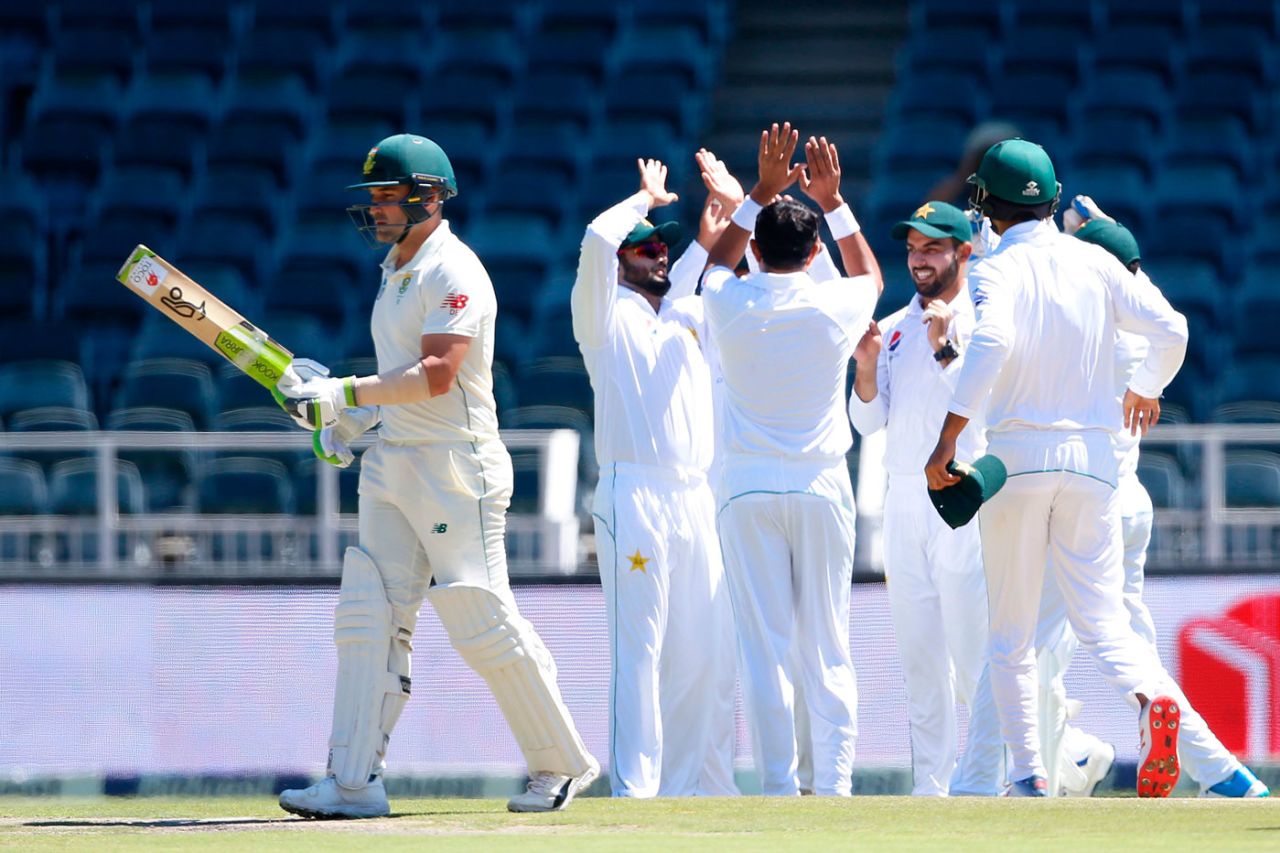 Dean Elgar walks off as Pakistan celebrate his wicket, South Africa v Pakistan, 3rd Test, Johannesburg, 1st day