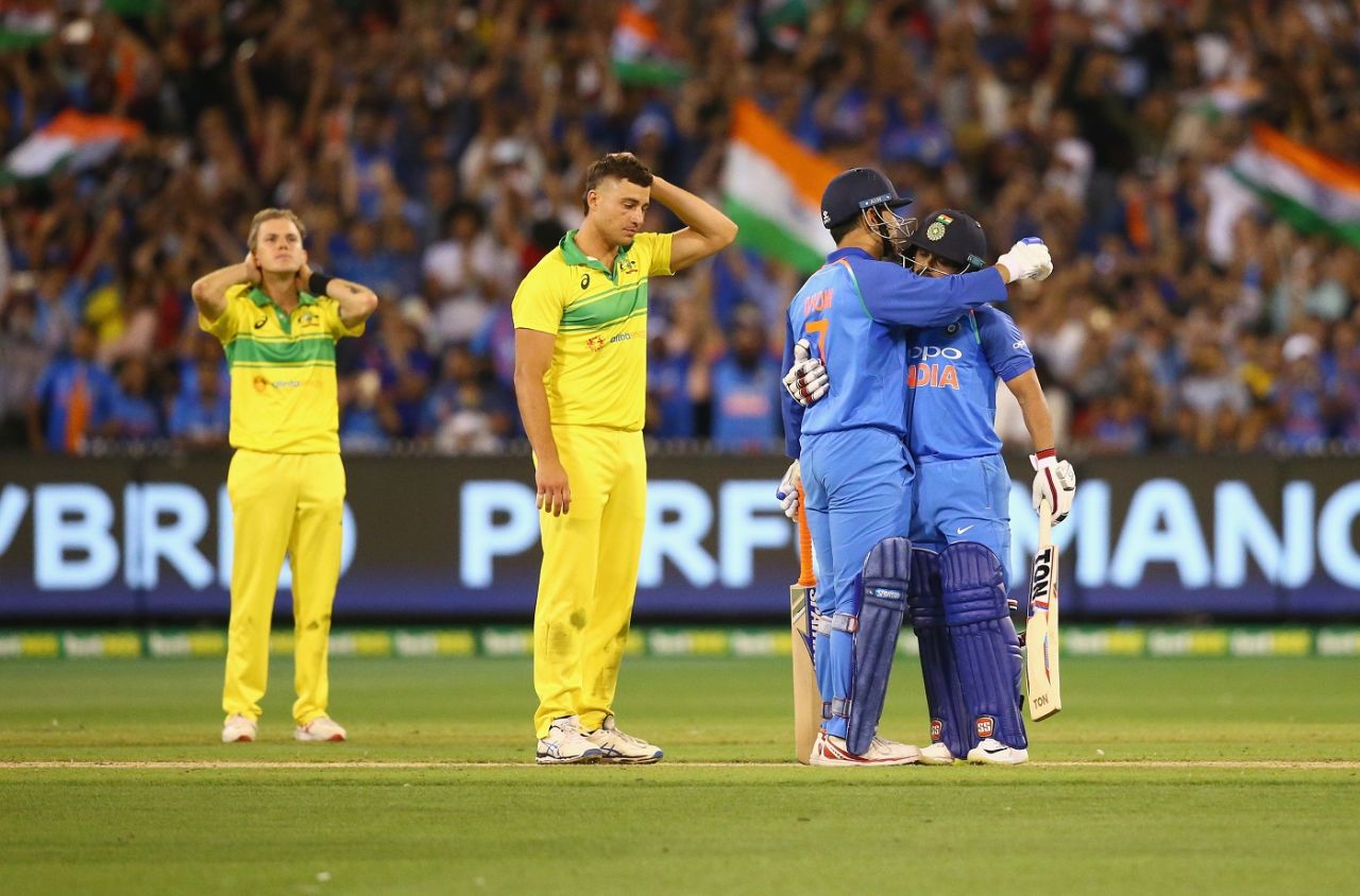 The faces say it all: Marcus Stoinis wears a dejected look as India's batsmen celebrate, Australia v India, 3rd ODI, Melbourne, January 18, 2019