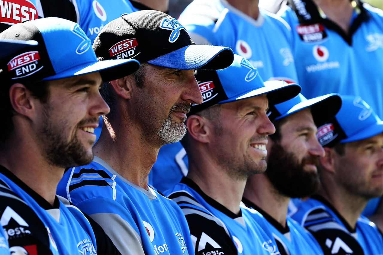 Coach Jason Gillespie sits with his Adelaide Strikers squad for a team photo ahead of the BBL final, Adelaide Strikers v Hobart Hurricanes, BBL 2017-18, final, Adelaide, February 4, 2018